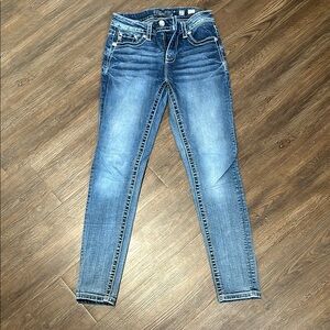Blue Skinny Jeans with Tapered Legs and Faded Wash